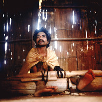 Boy in shackles_ East Timor,People_show 2006